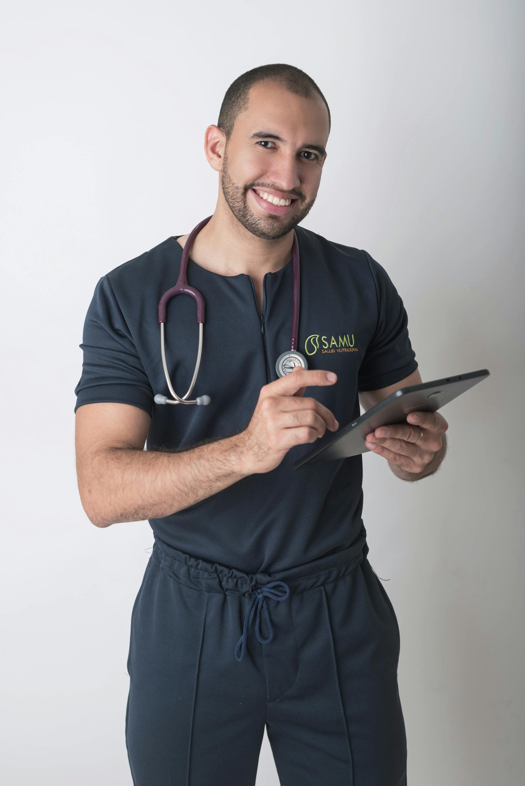 doctor-with-stethoscope-and-tablet